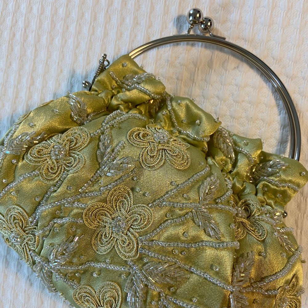 Satin beaded evening bag with silver frame handle